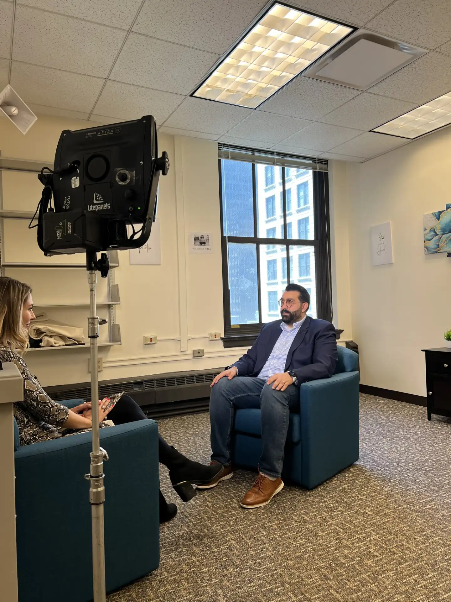 Emad Mahou speaking during an interview by CBS Chicago